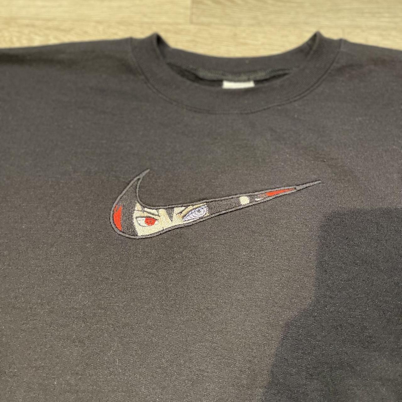 Itachi embroidered nike logo sweater, still in Depop