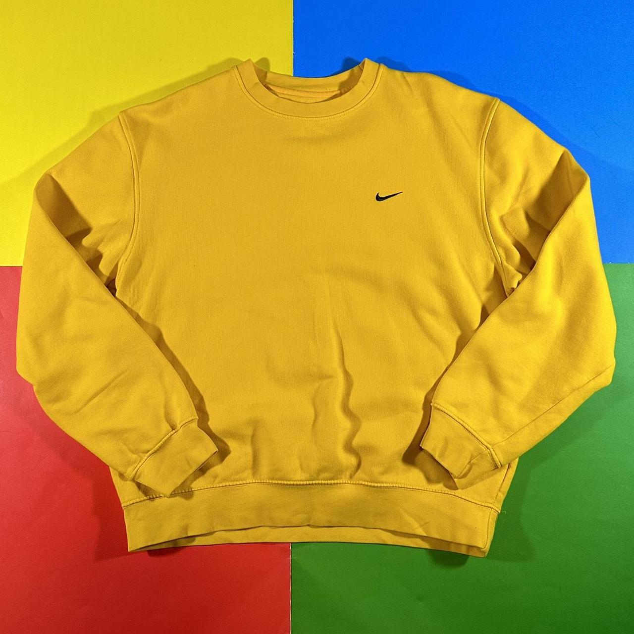 pastel yellow nike sweatshirt