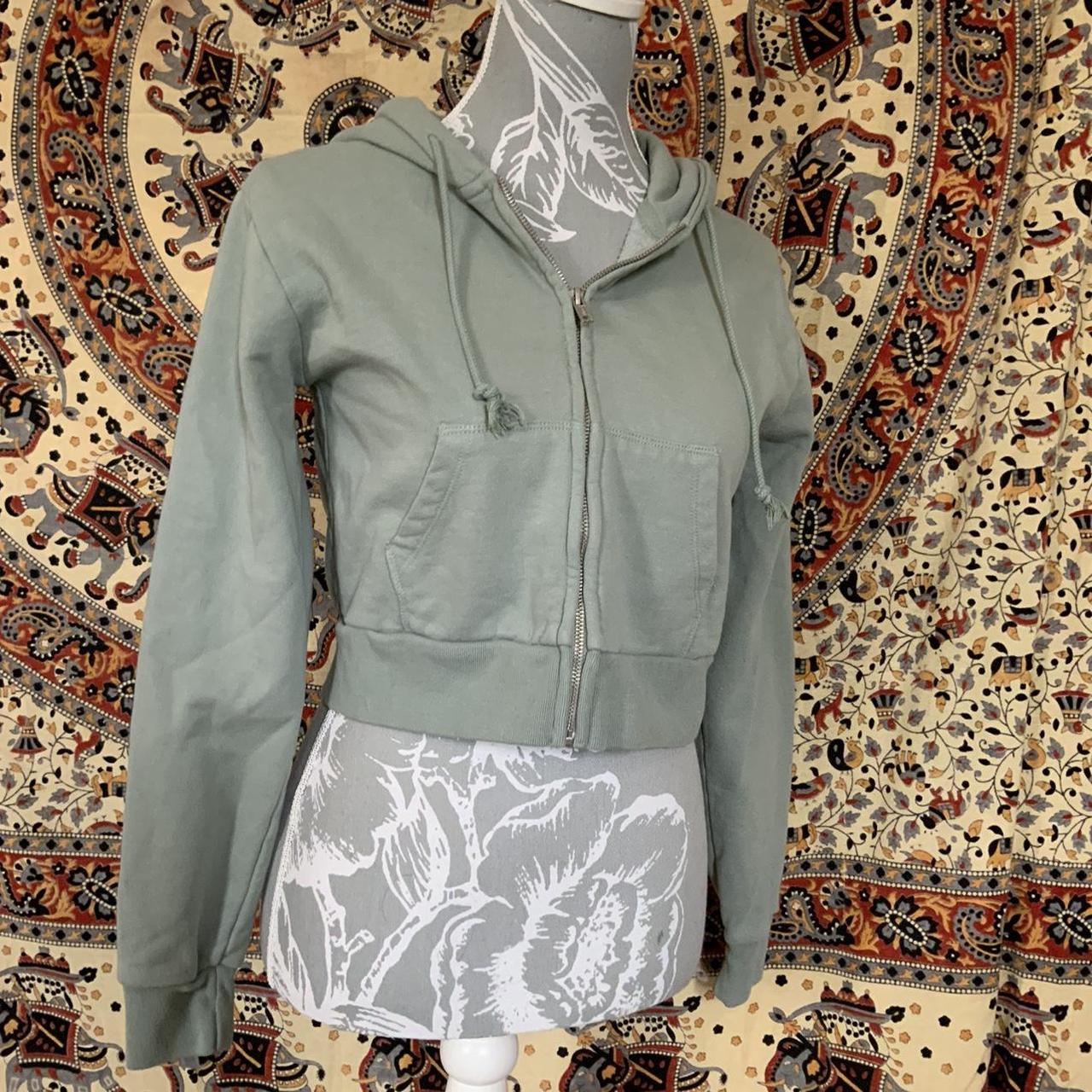 Brandy Melville green zip up hoodie Size small... Depop