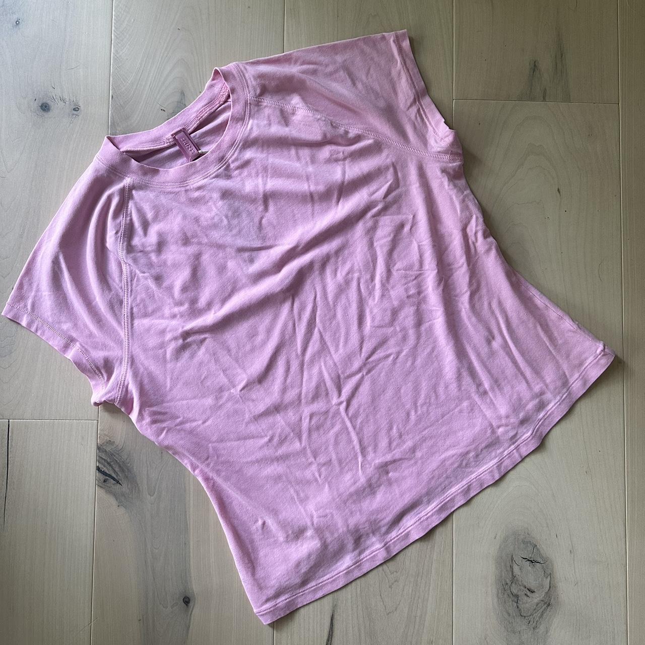 skims light pink shirt｜TikTok Search