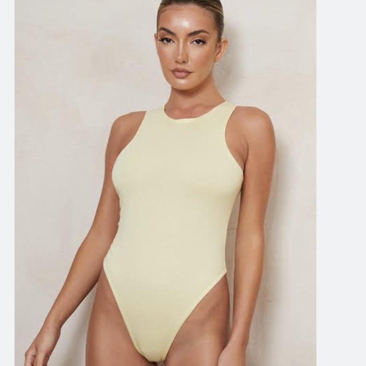 Pale Yellow Body Suit Size 10 Doesnt Have Depop