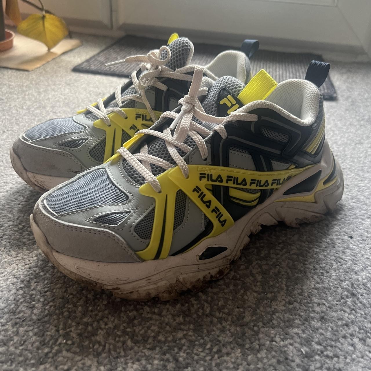 fila retro trainers with grey and yellow design worn... - Depop