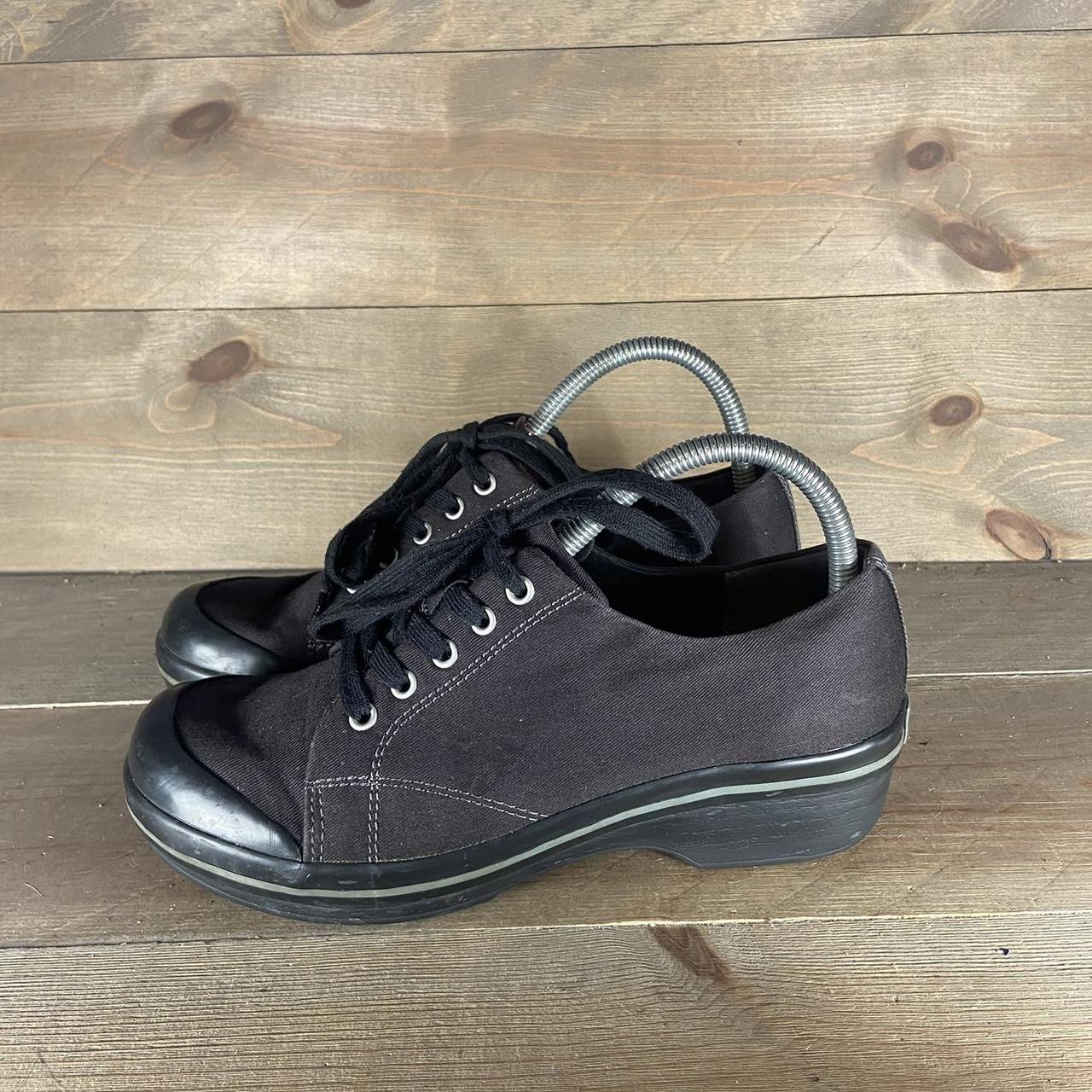 Dansko lace up store clogs