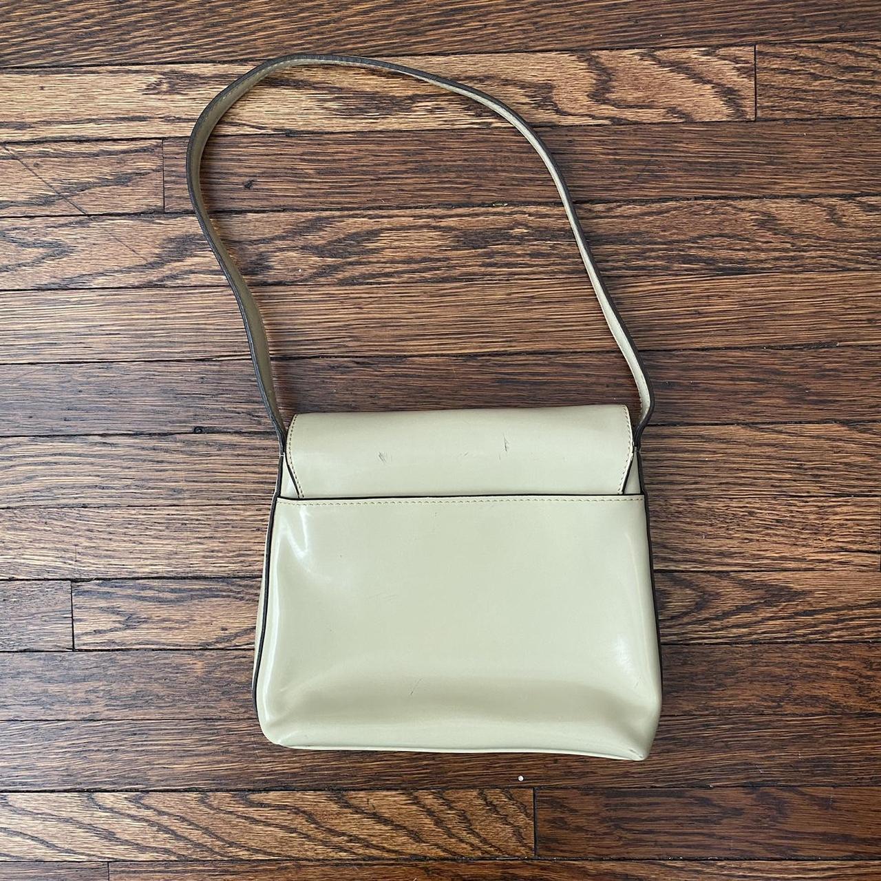 Medium size beige/nude DKNY bag. Used a few times - Depop