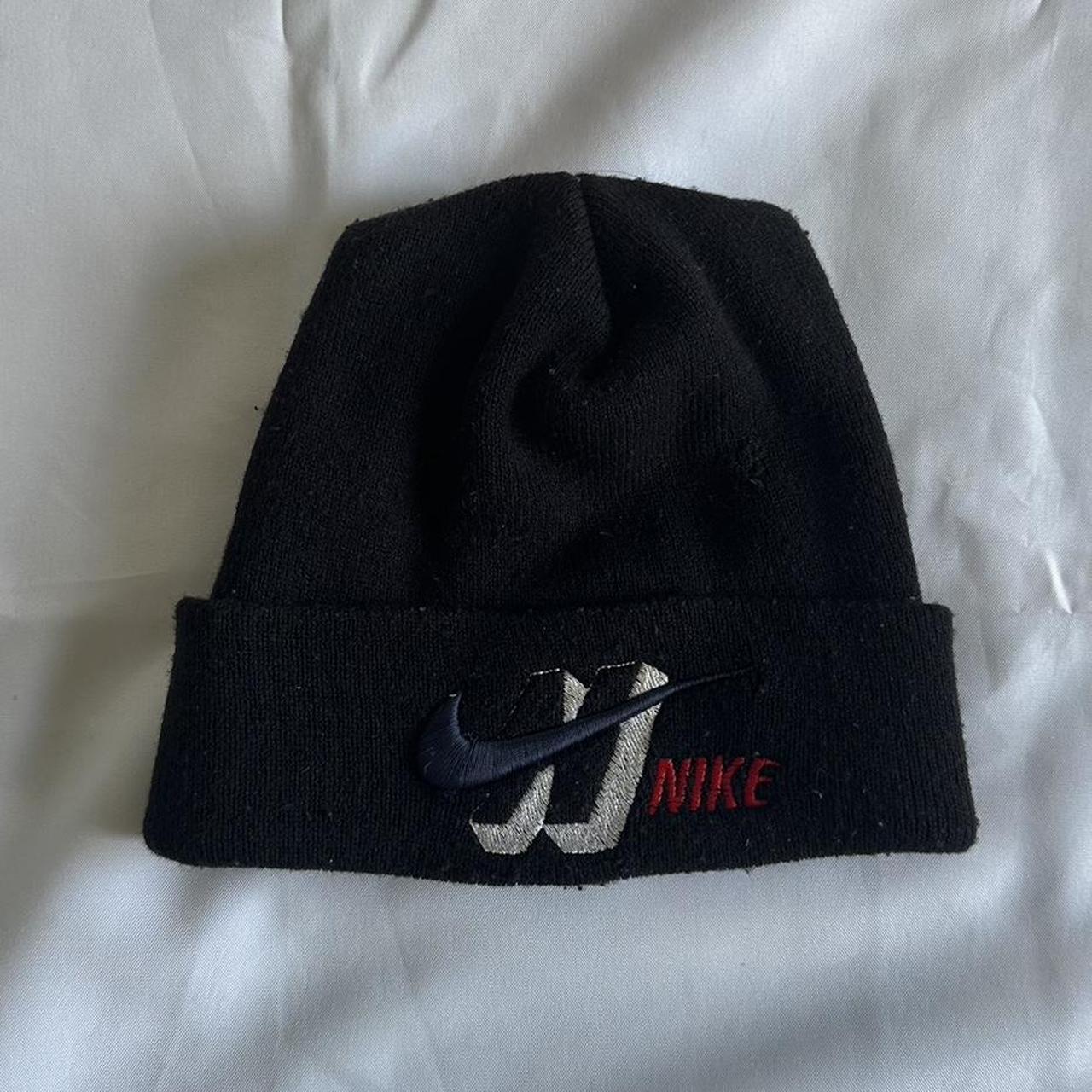 black nike beanie second hand some loose threading... - Depop