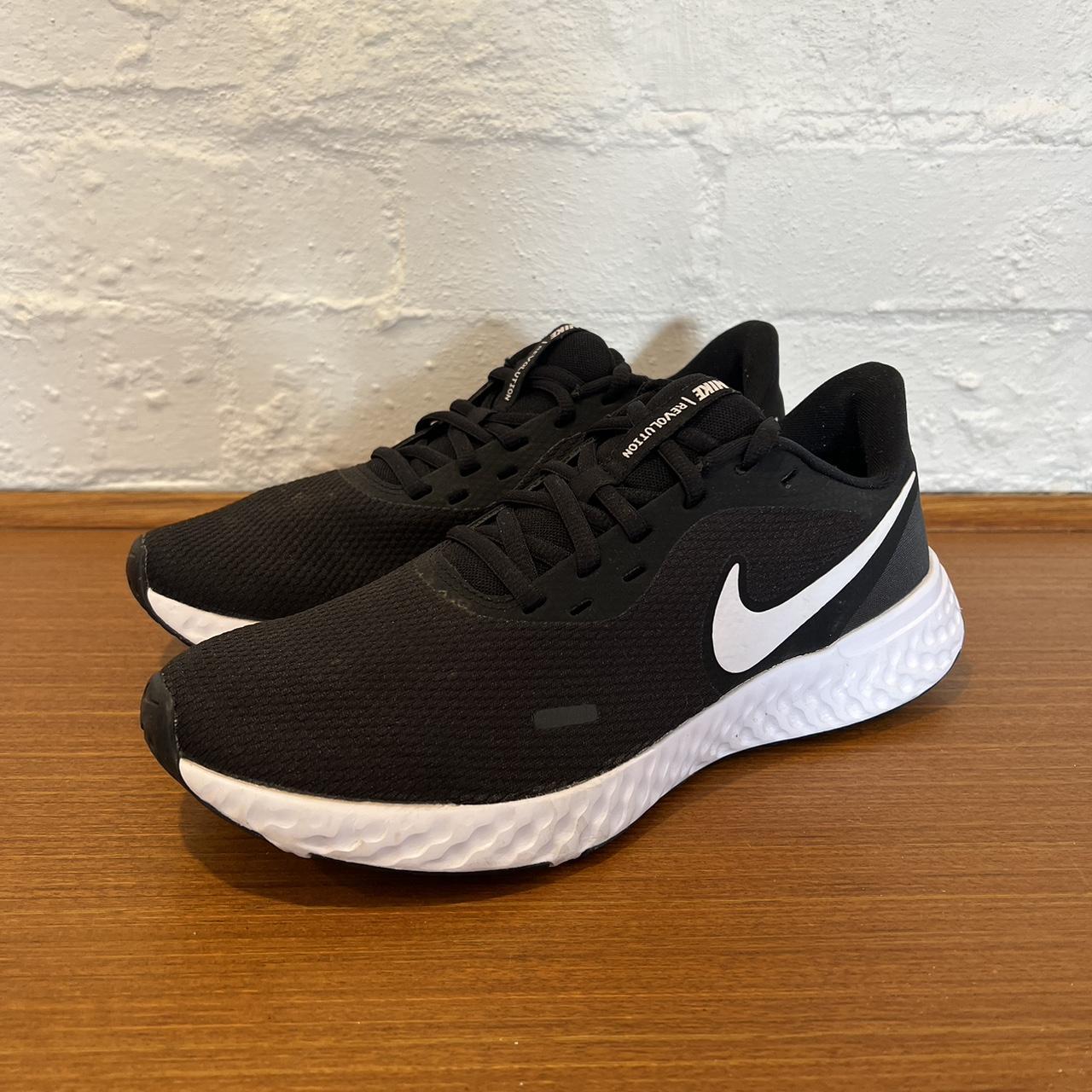 womens black nike revolution trainers