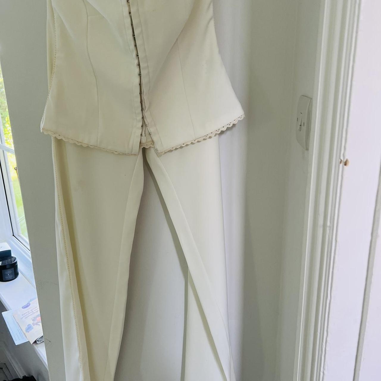 Gorgeous cream trouser suit . Eye and hook corset... - Depop