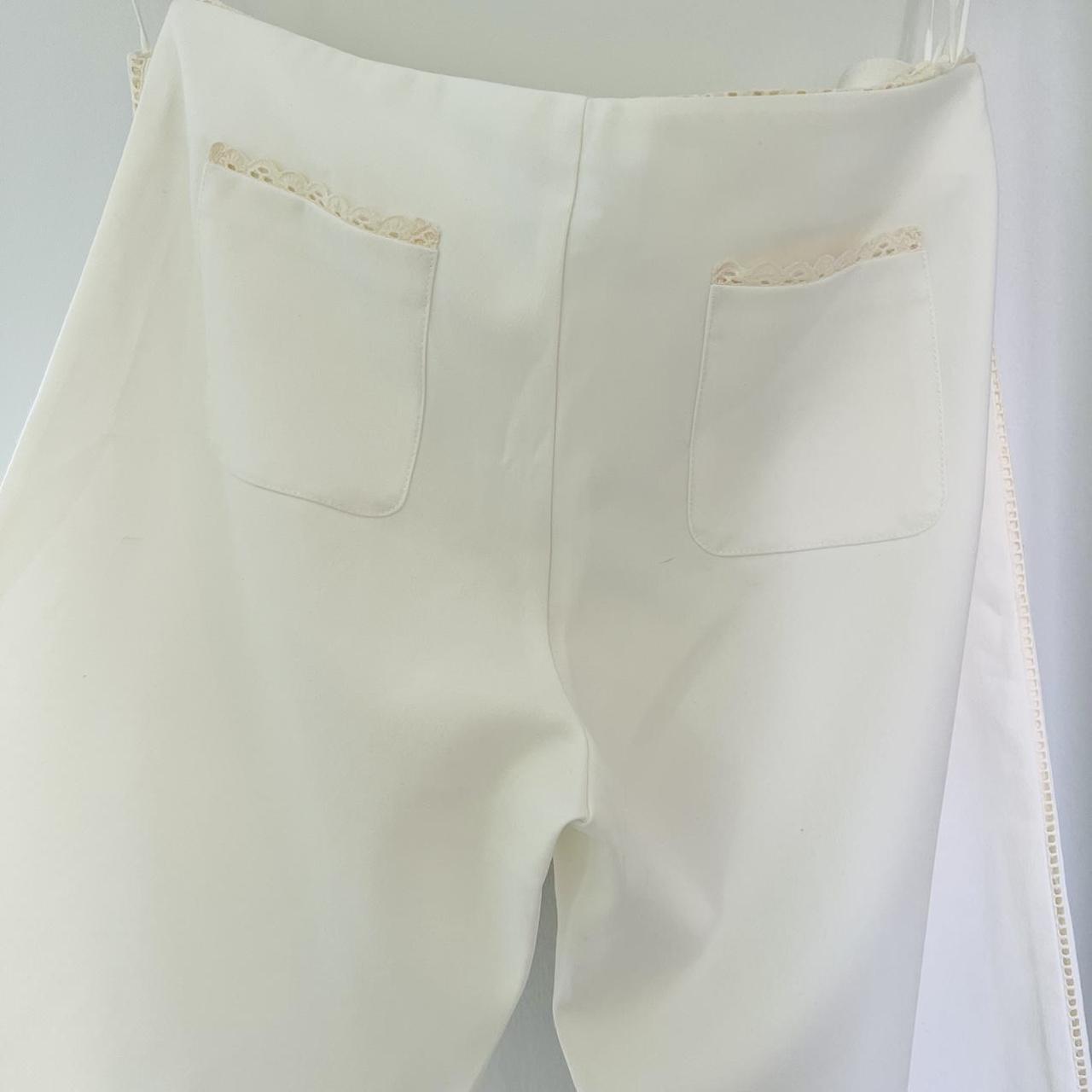 cream trouser suit . Eye and hook corset... Depop