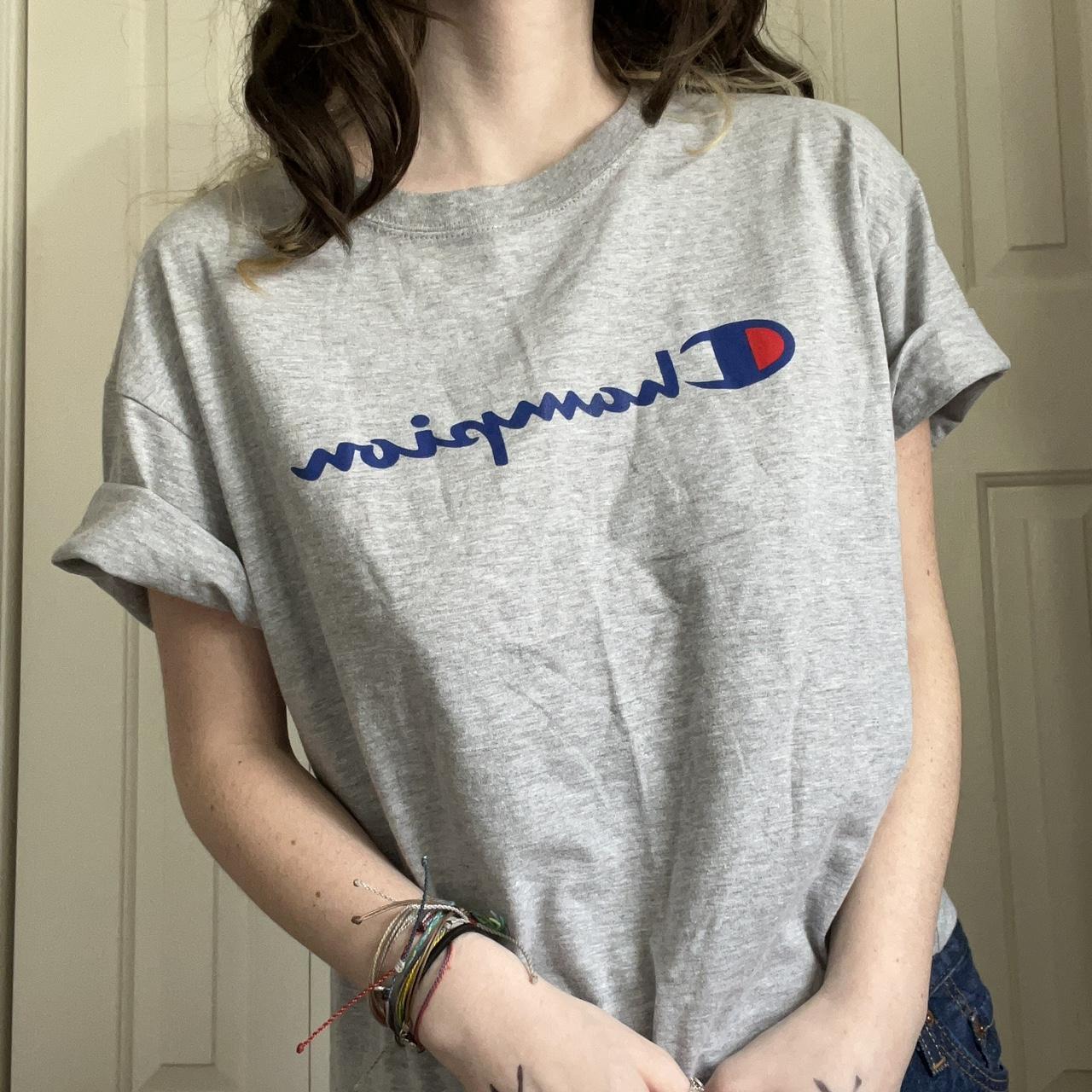 light gray cropped champion t-shirt with red