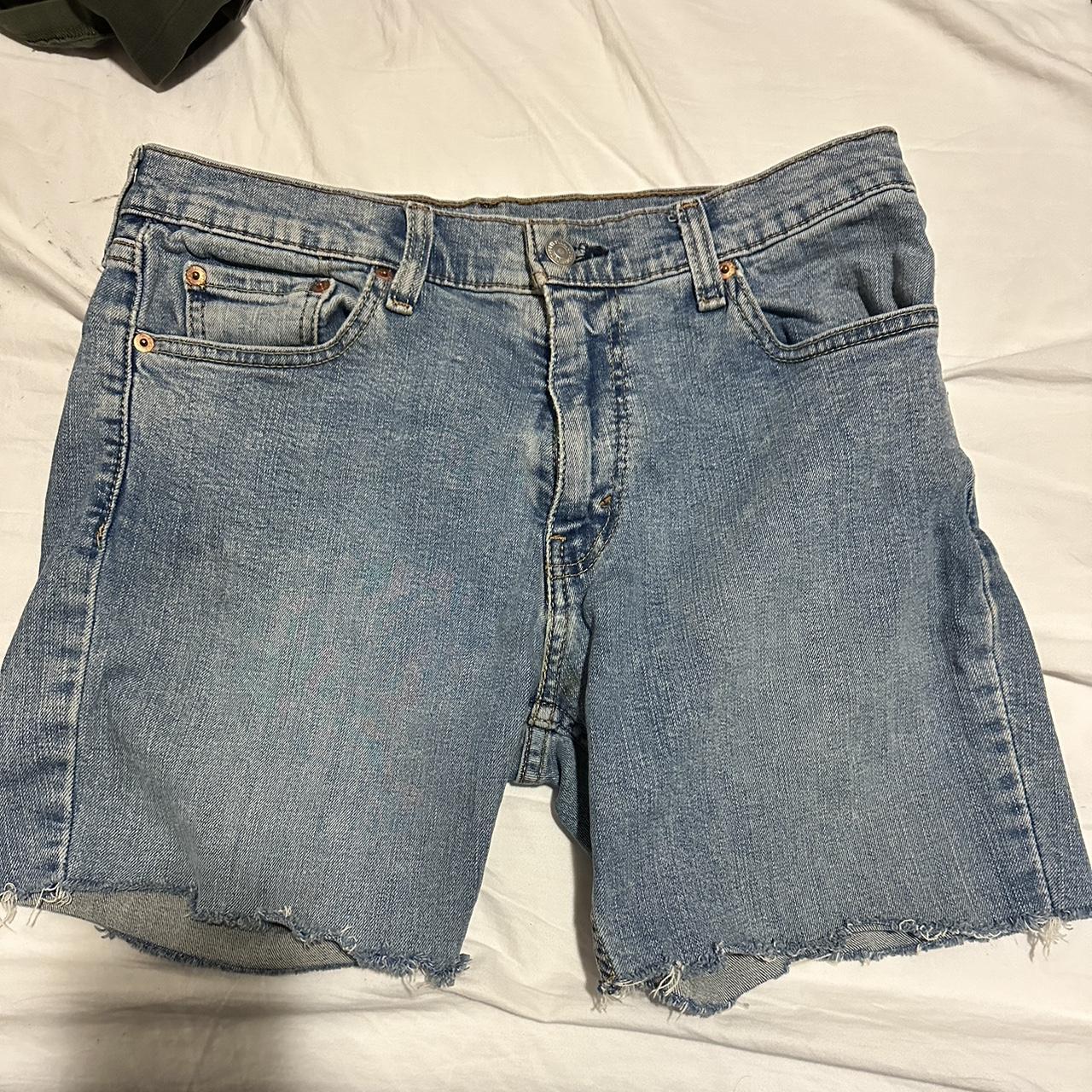 Levi jeans that were cut into jorts , they go to mid... Depop