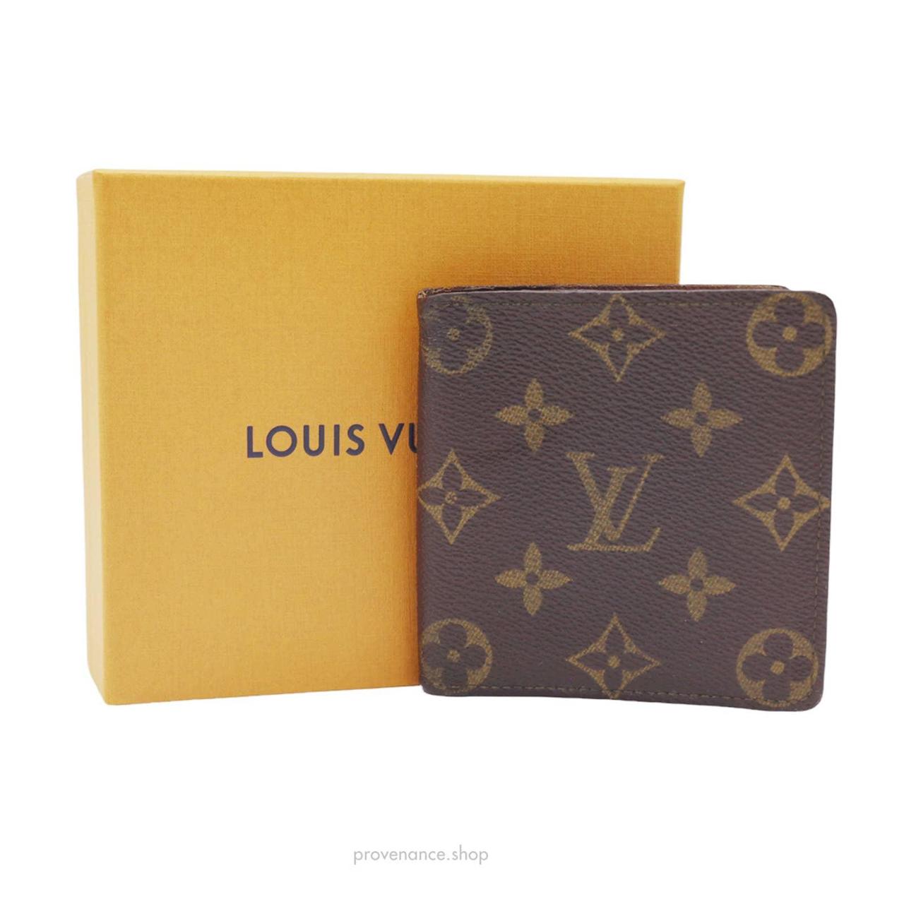 Louis Vuitton Monogram Bifold Wallet with wear seen - Depop