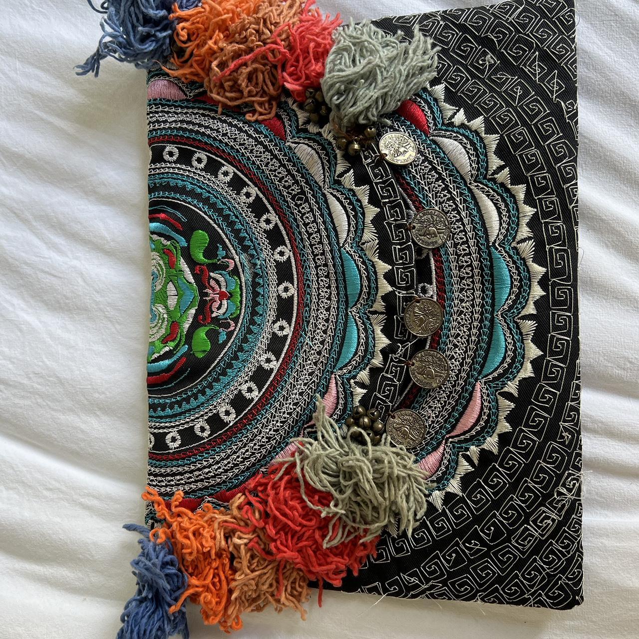 A boho style clutch bag sustainably made by Thai Depop