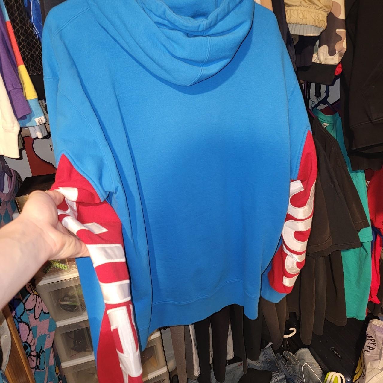 Supreme blue sales red hoodie