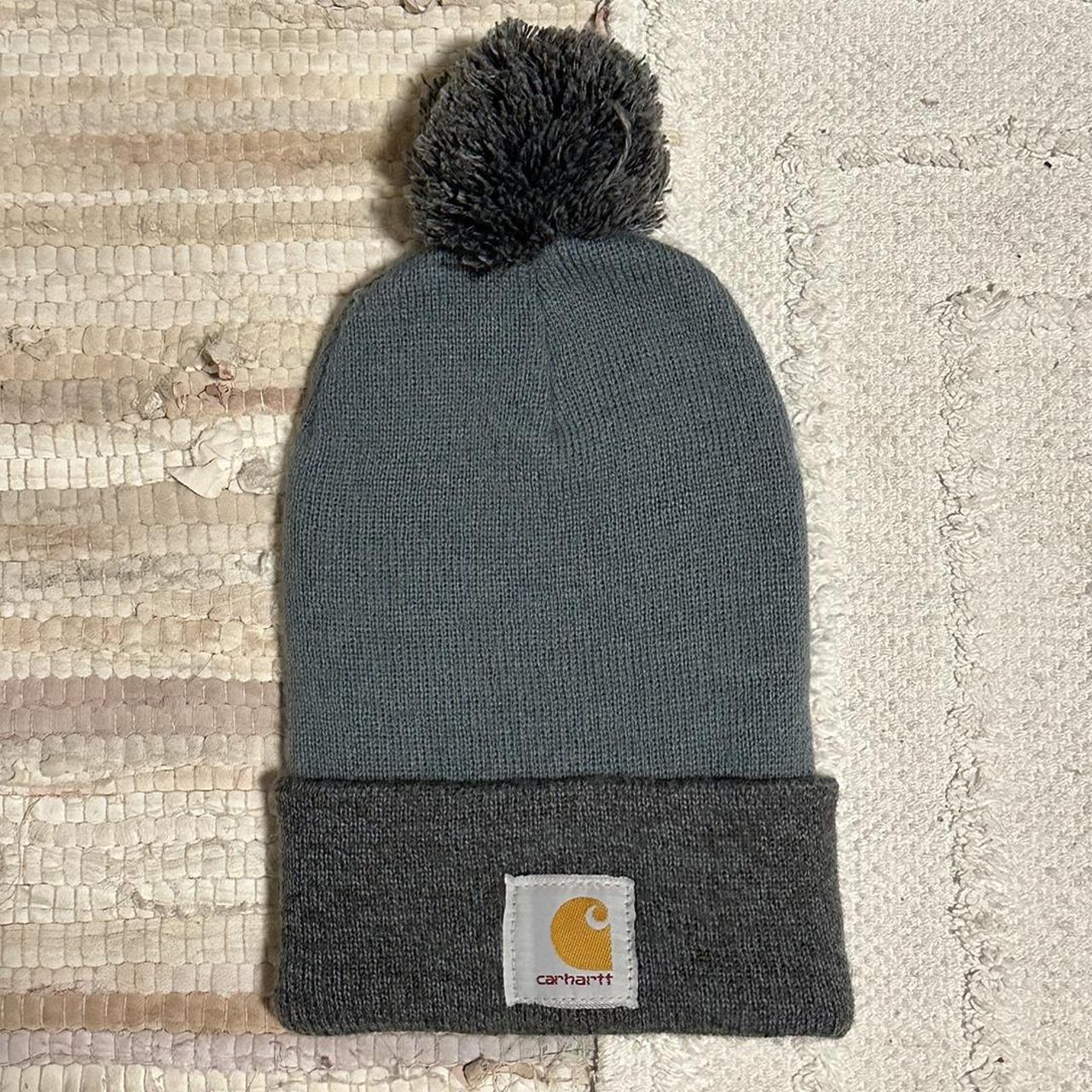 carhartt beanie with pom pom used once! very pretty... Depop