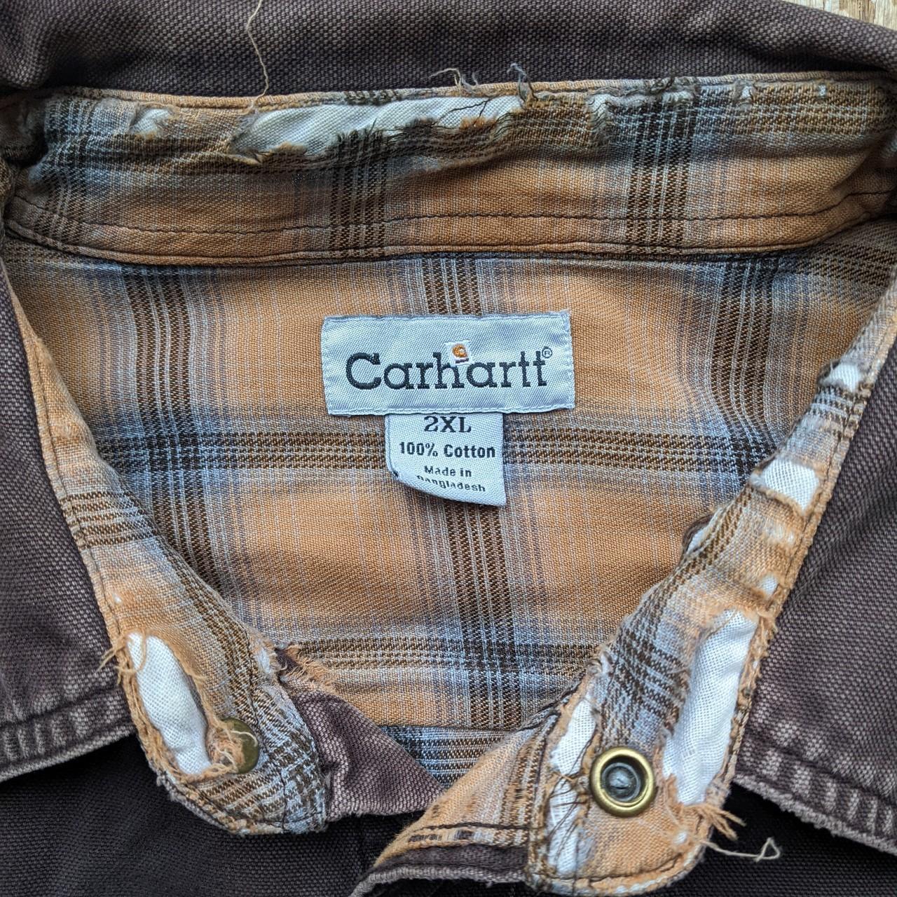 Carhartt canvas jacket, the cuffs and neckline are... - Depop