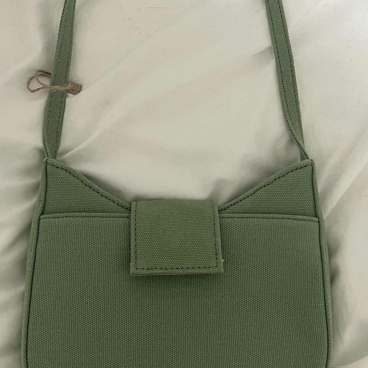 Brandy melville green purse with floral... Depop