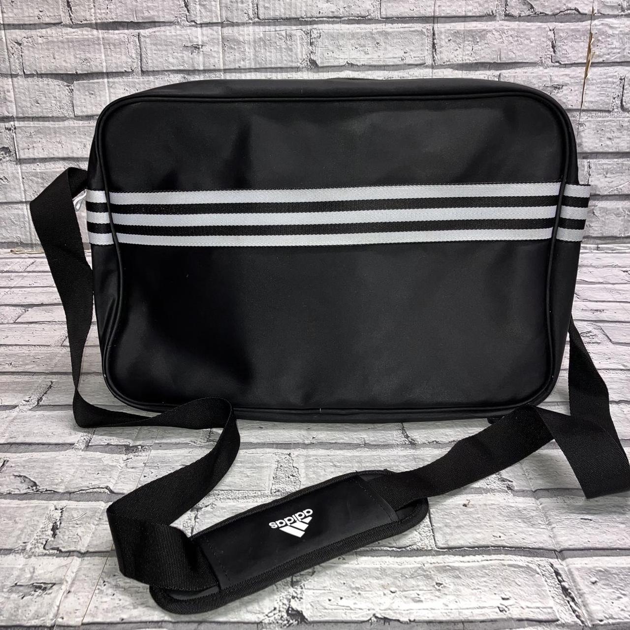 Adidas black sports cross body bag with classic 3... Depop