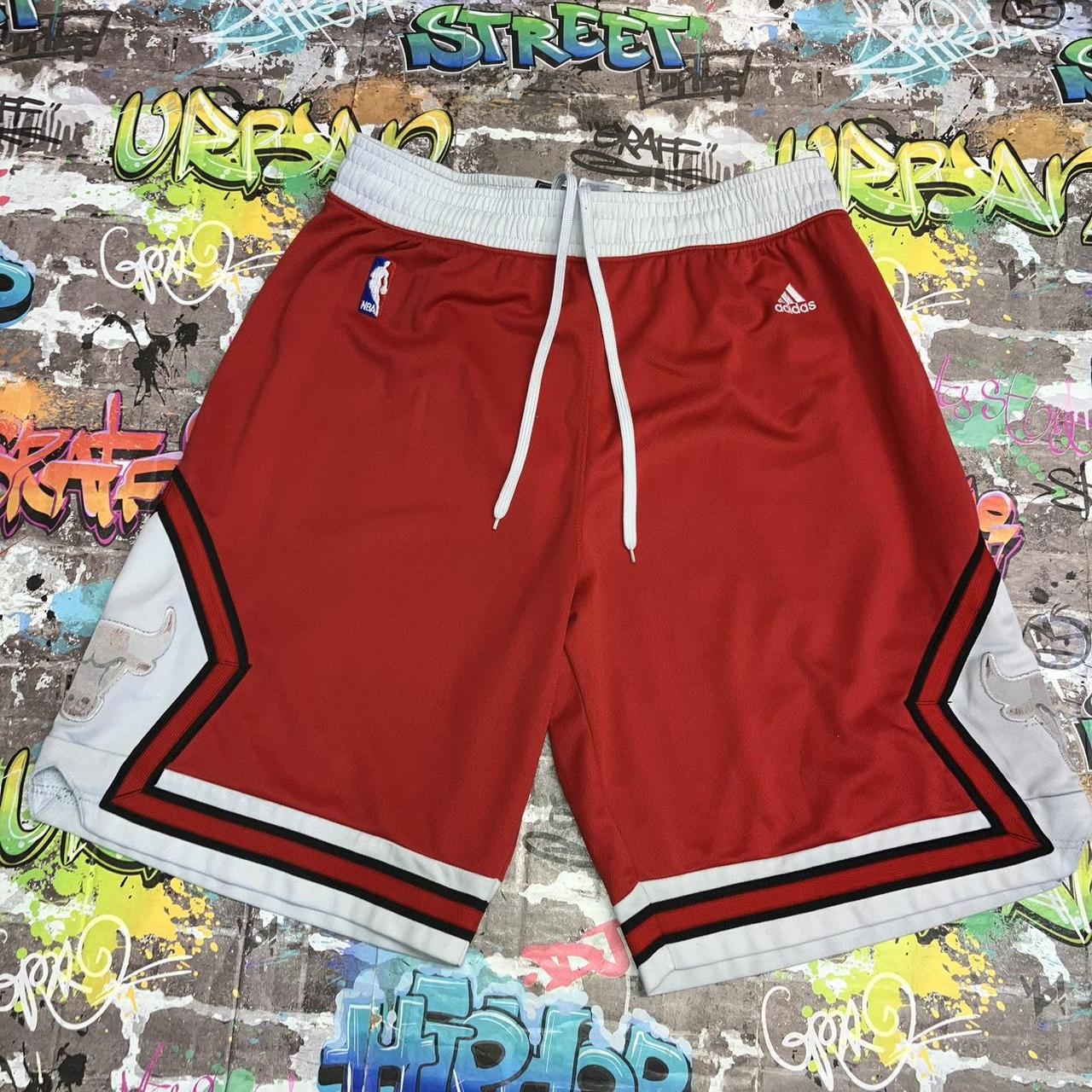 Adidas Chicago bulls red shorts with white trim made. Depop