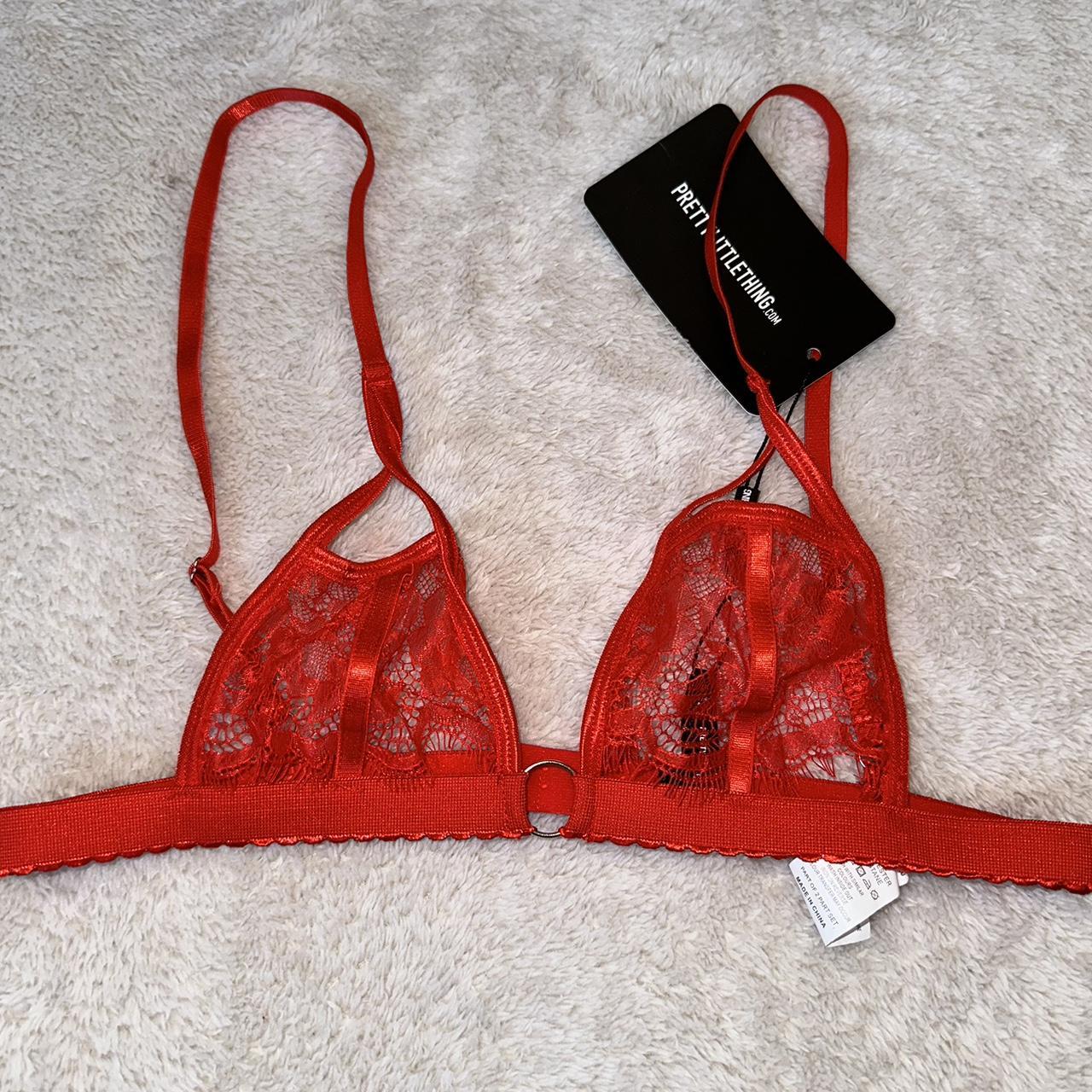 See through red bralette. Clasps in back with... - Depop