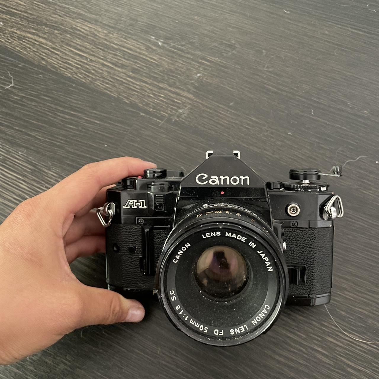 Canon A1 Film Camera w strap and lens cap 50mm... Depop