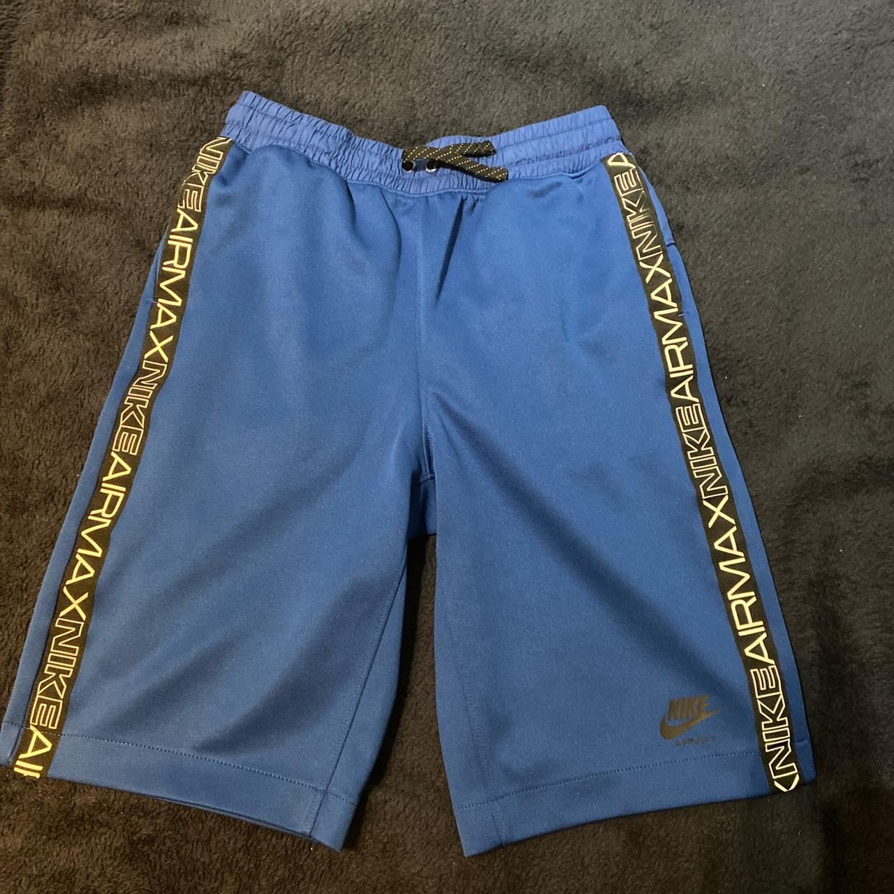 university blue nike shorts