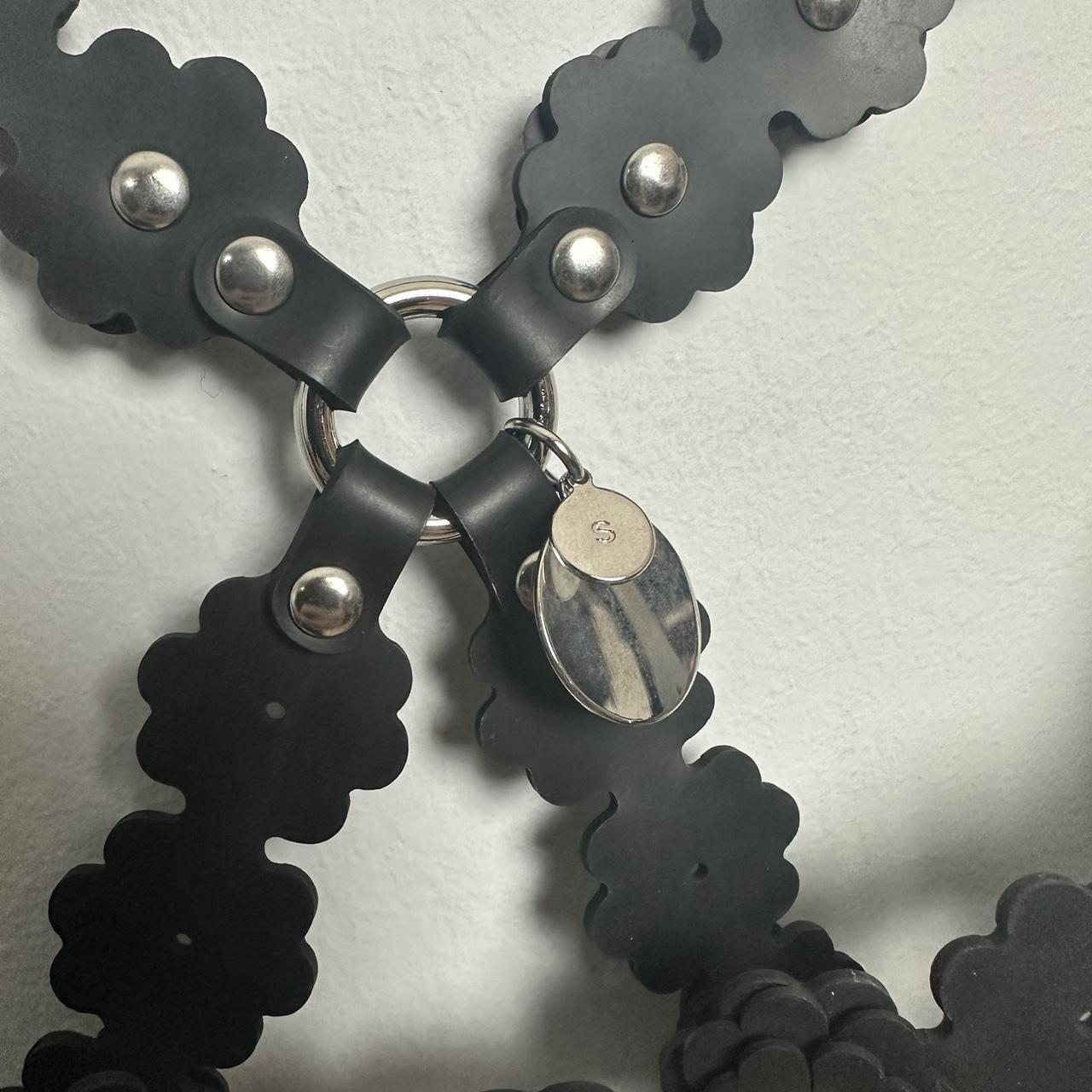 Noir Kei Ninomiya Floral-appliqué harness Noir Kei Ninomiya