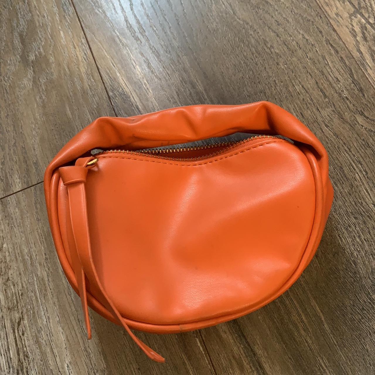 EGO mini orange clutch bag, never used, originally... Depop