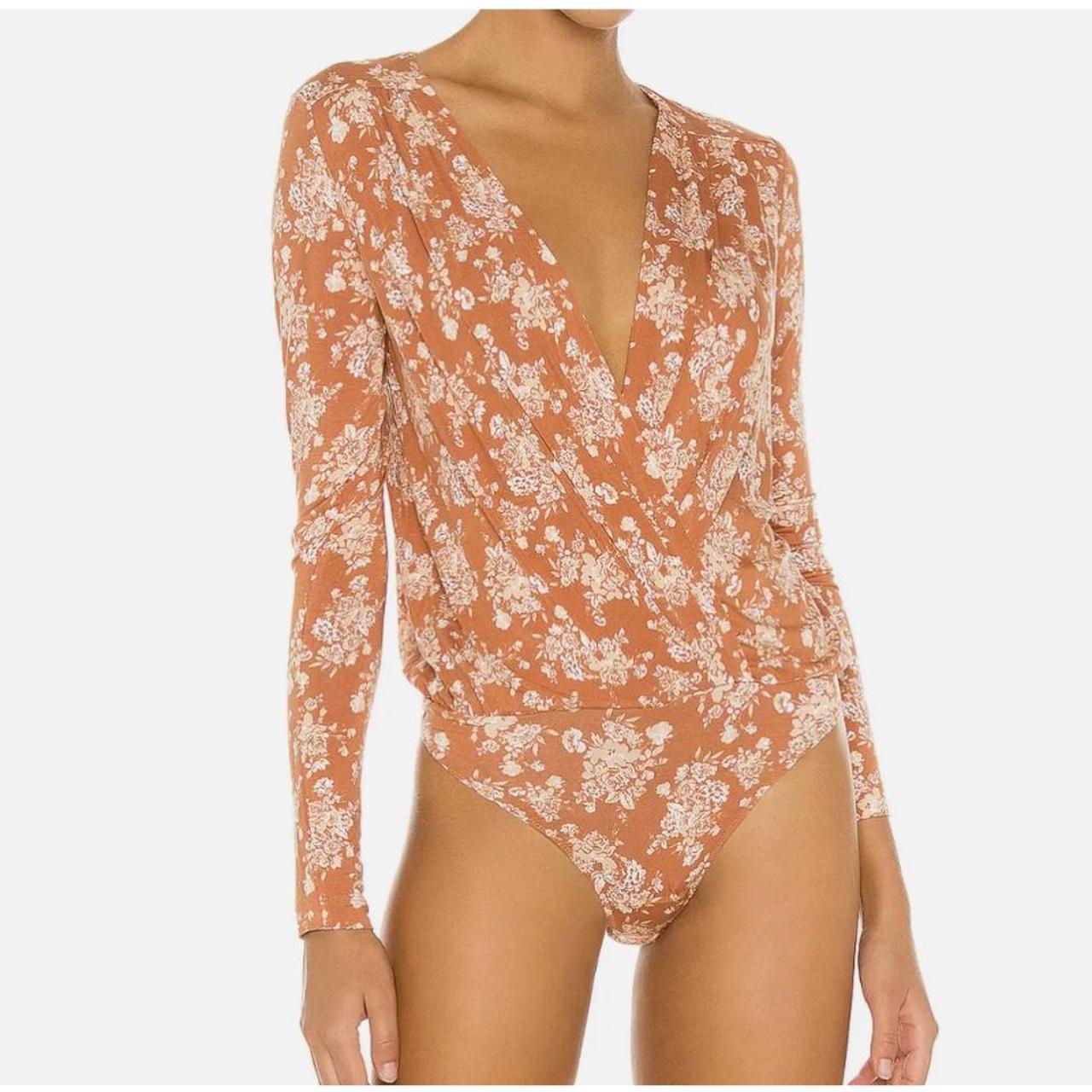 Free People Turnt Rust floral bodysuit Surplice - Depop