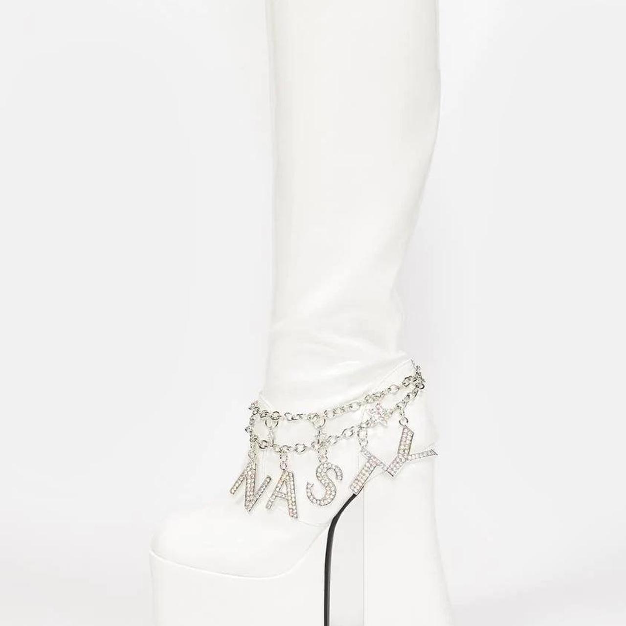Dolls Kill Women's White and Silver Boots Depop