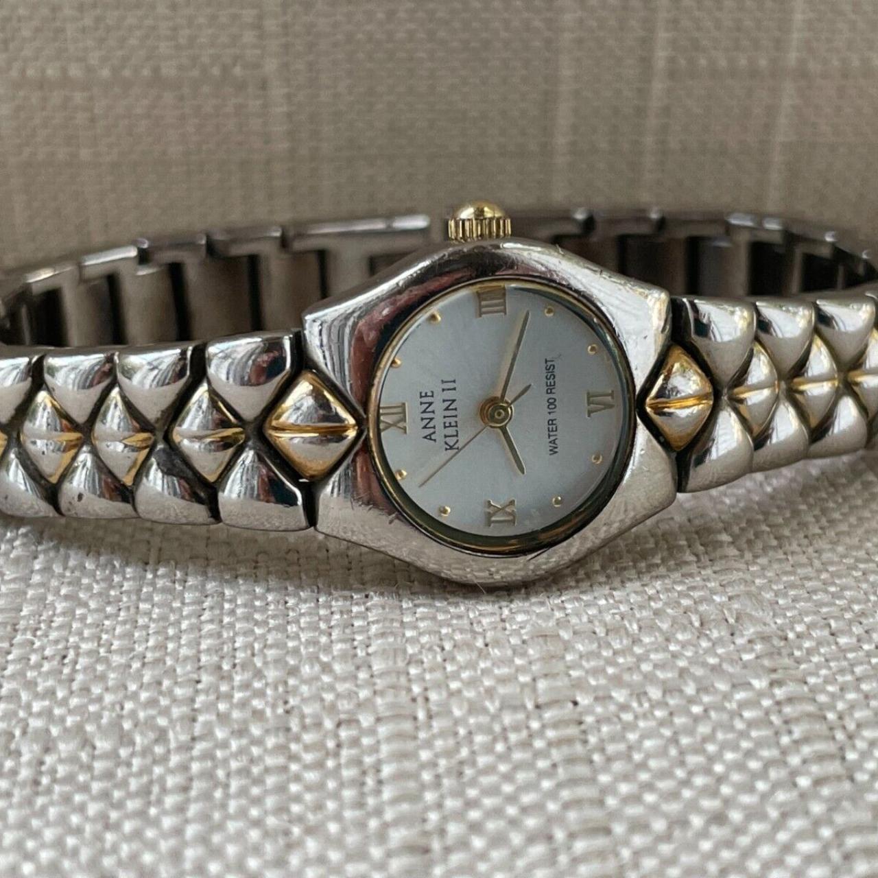 Anne klein watch hot sale water 100 resist