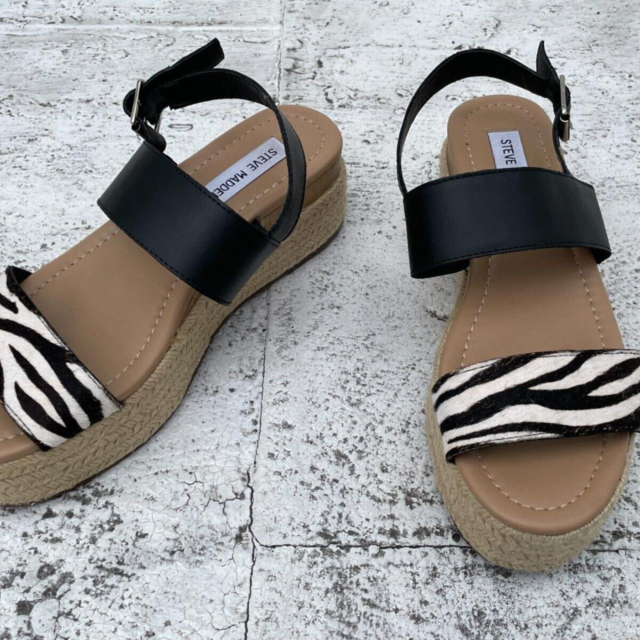 Steve madden black on sale and tan sandals