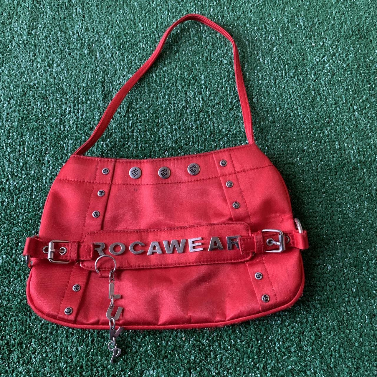 Sold Roca wear mini handbag