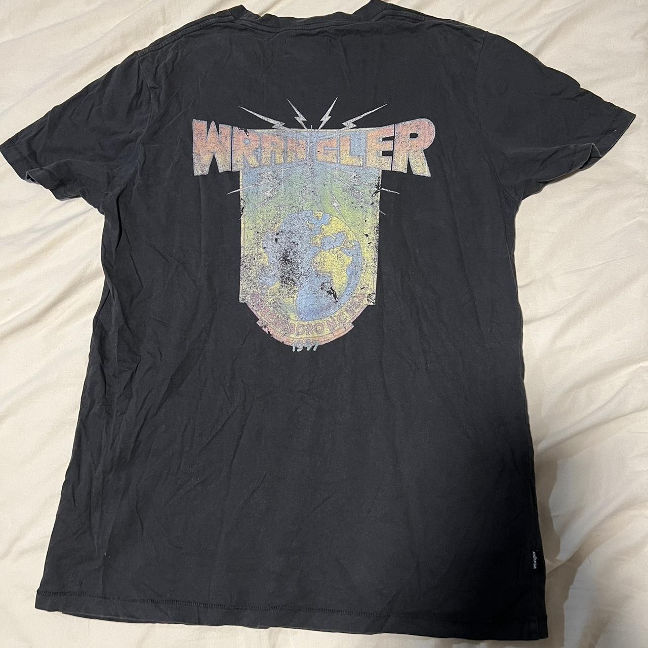 wrangler tee mark on front, should come out with... - Depop