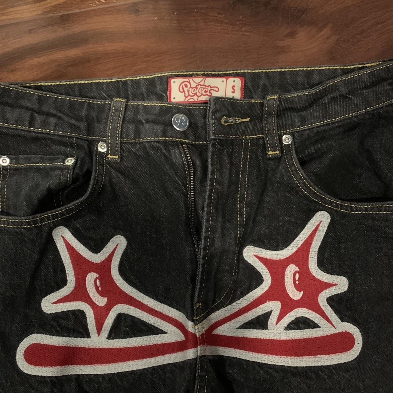 Protect ldn spike denim jeans red y2k wide leg... Depop