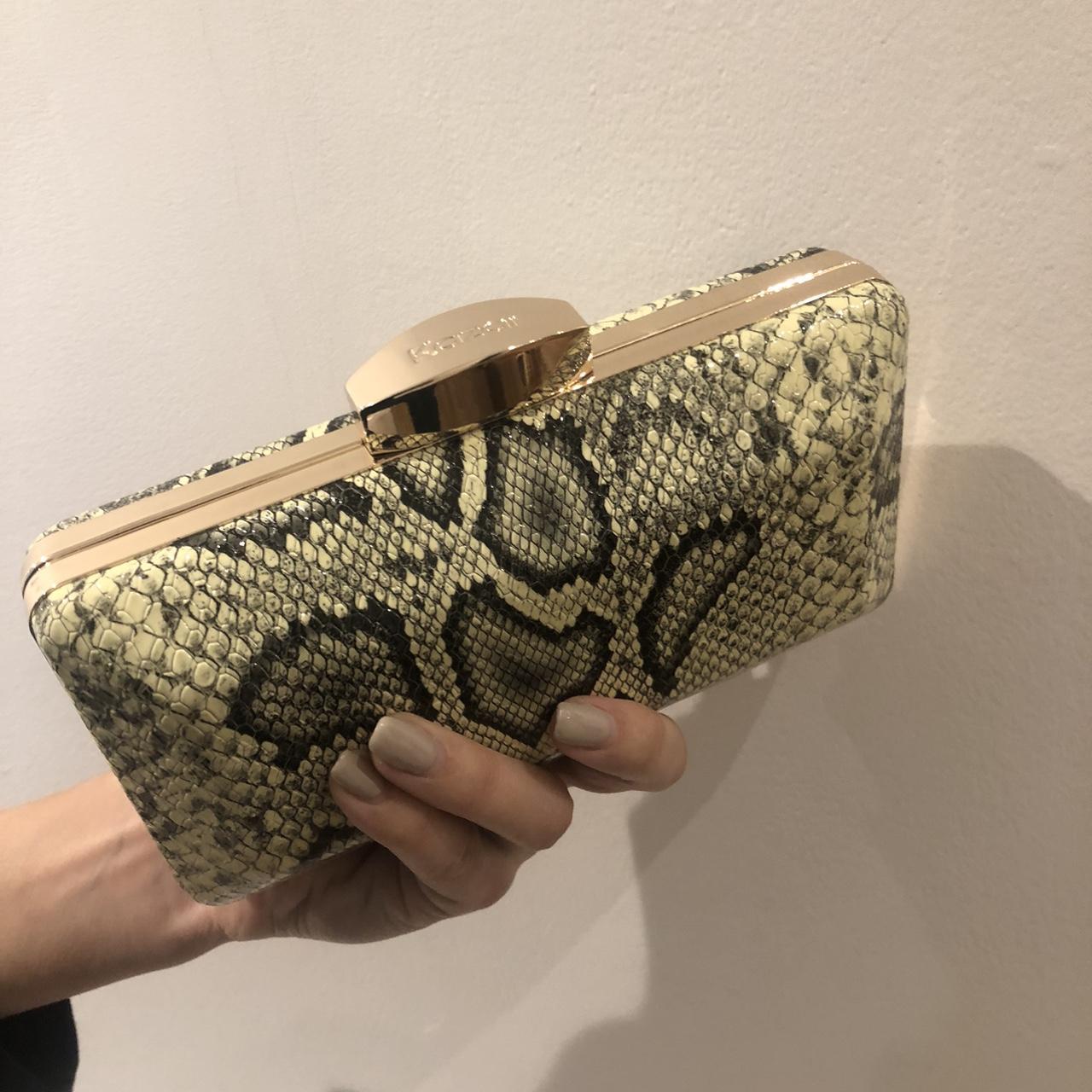 Beige snake best sale print clutch bag