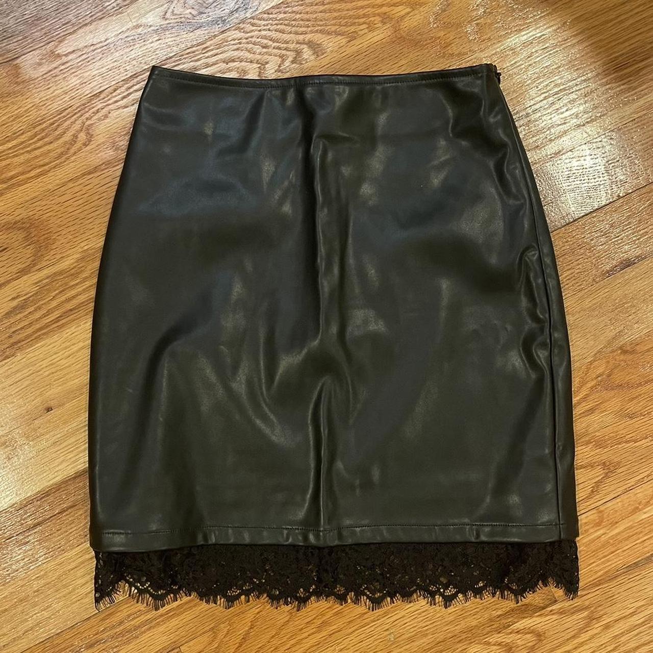 High waisted black leather skirt with lace trim. Depop