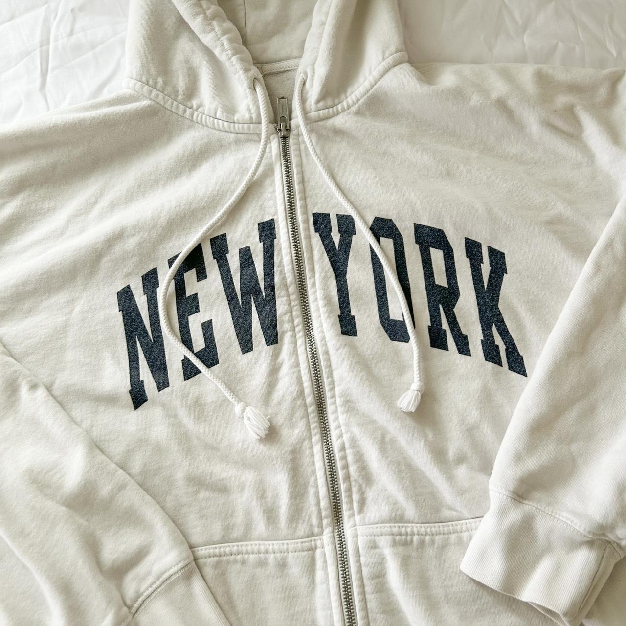 Brandy Melville White New York Full Zip Christy... Depop