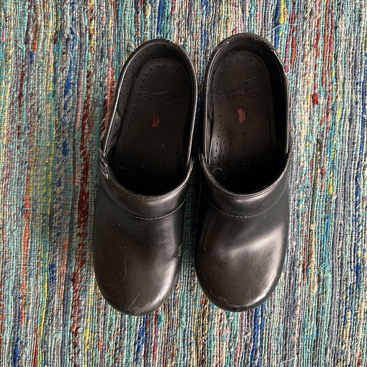 Dansko Women's Black Clogs | Depop