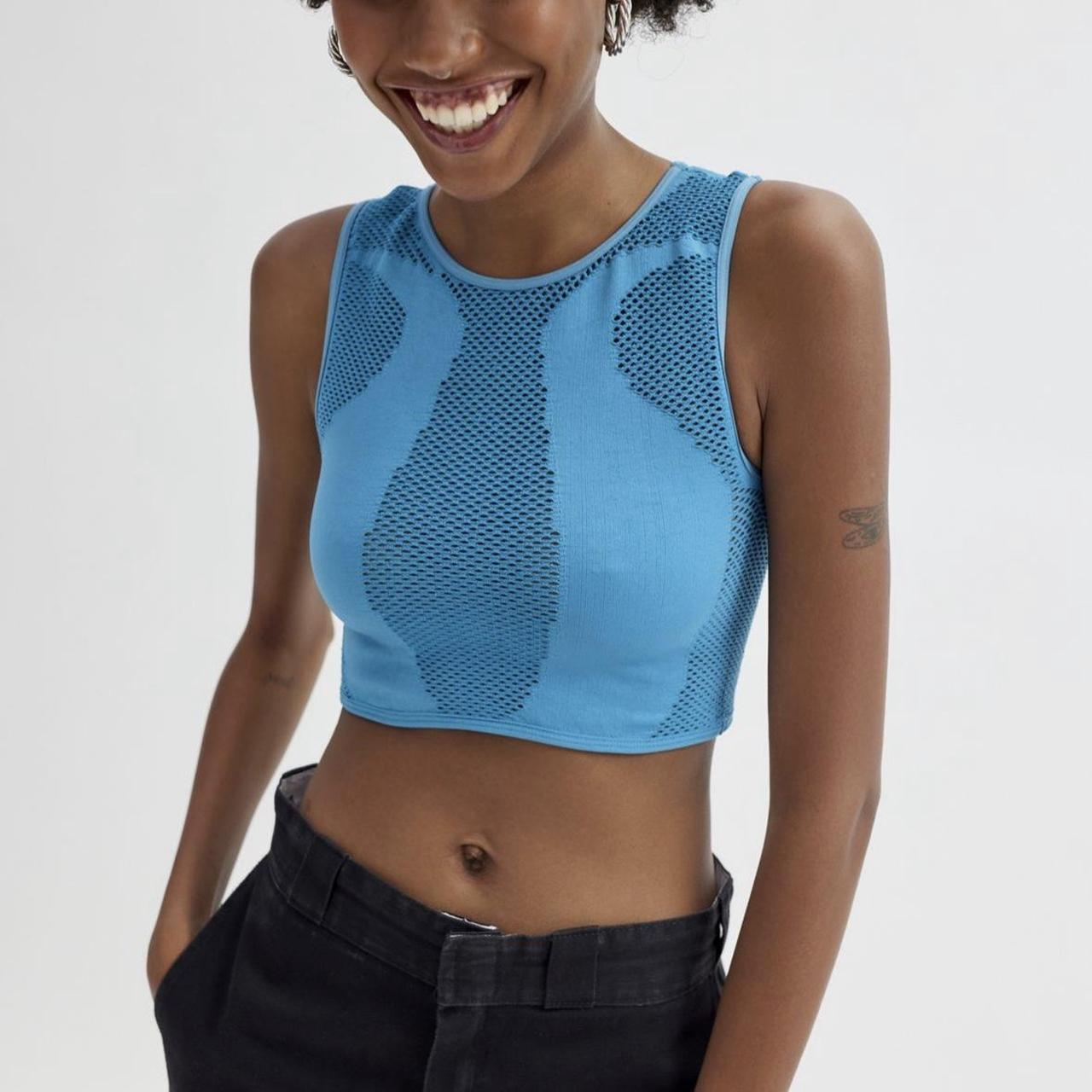 Crop top shop with vest underneath