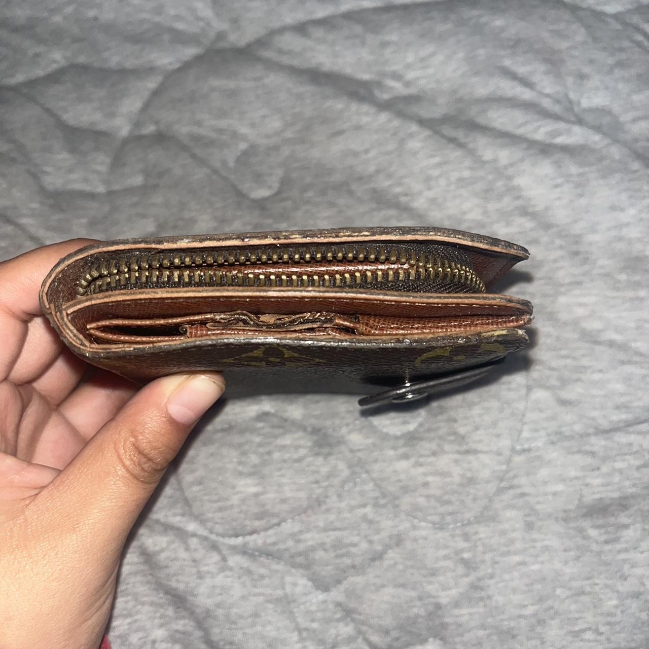 Real LV wallet Send offers!! It looks scratches - Depop