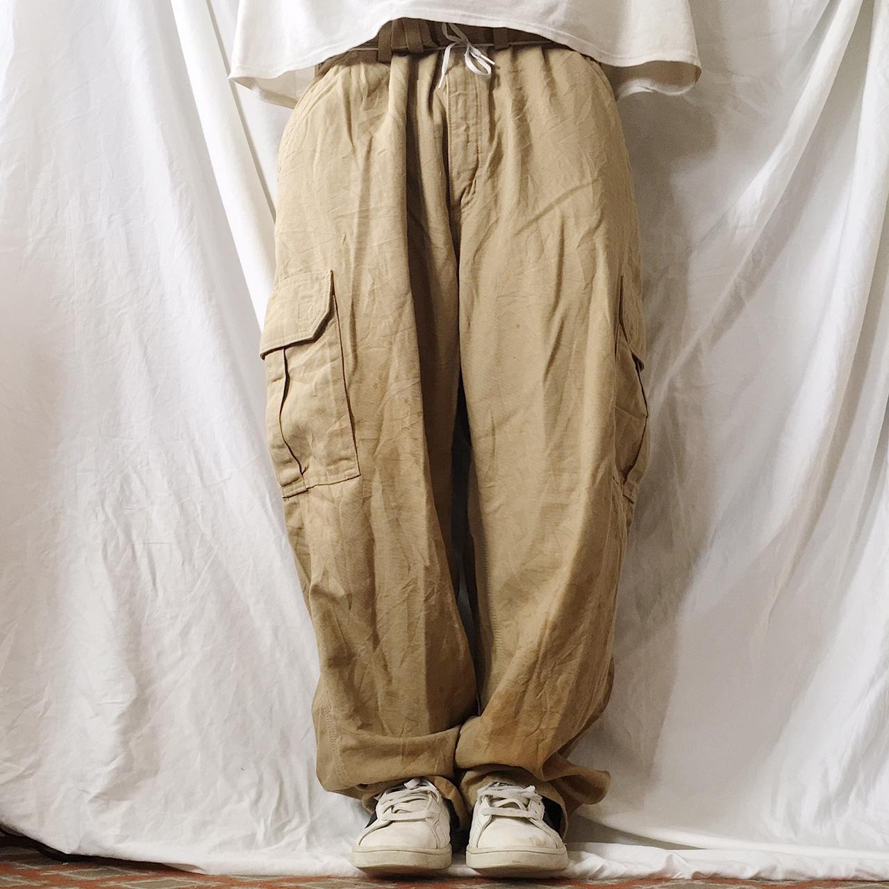 Carhartt baggy tan cargos in W44 L32. Cargo trousers... Depop