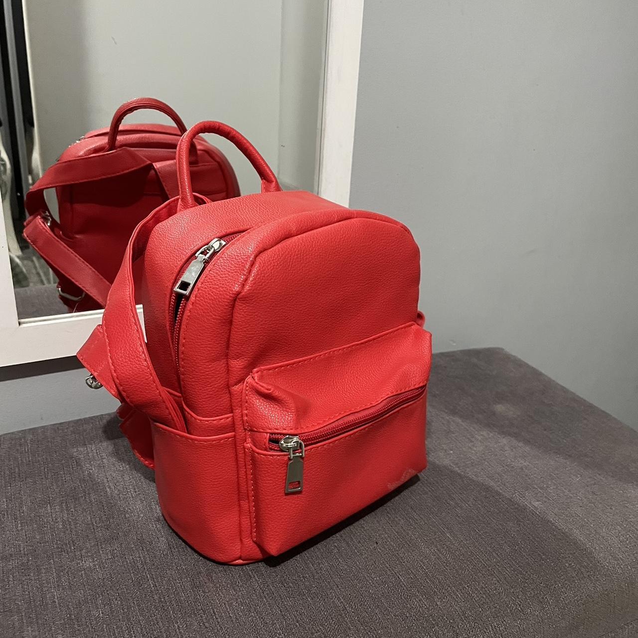 Mini red hot sale leather backpack