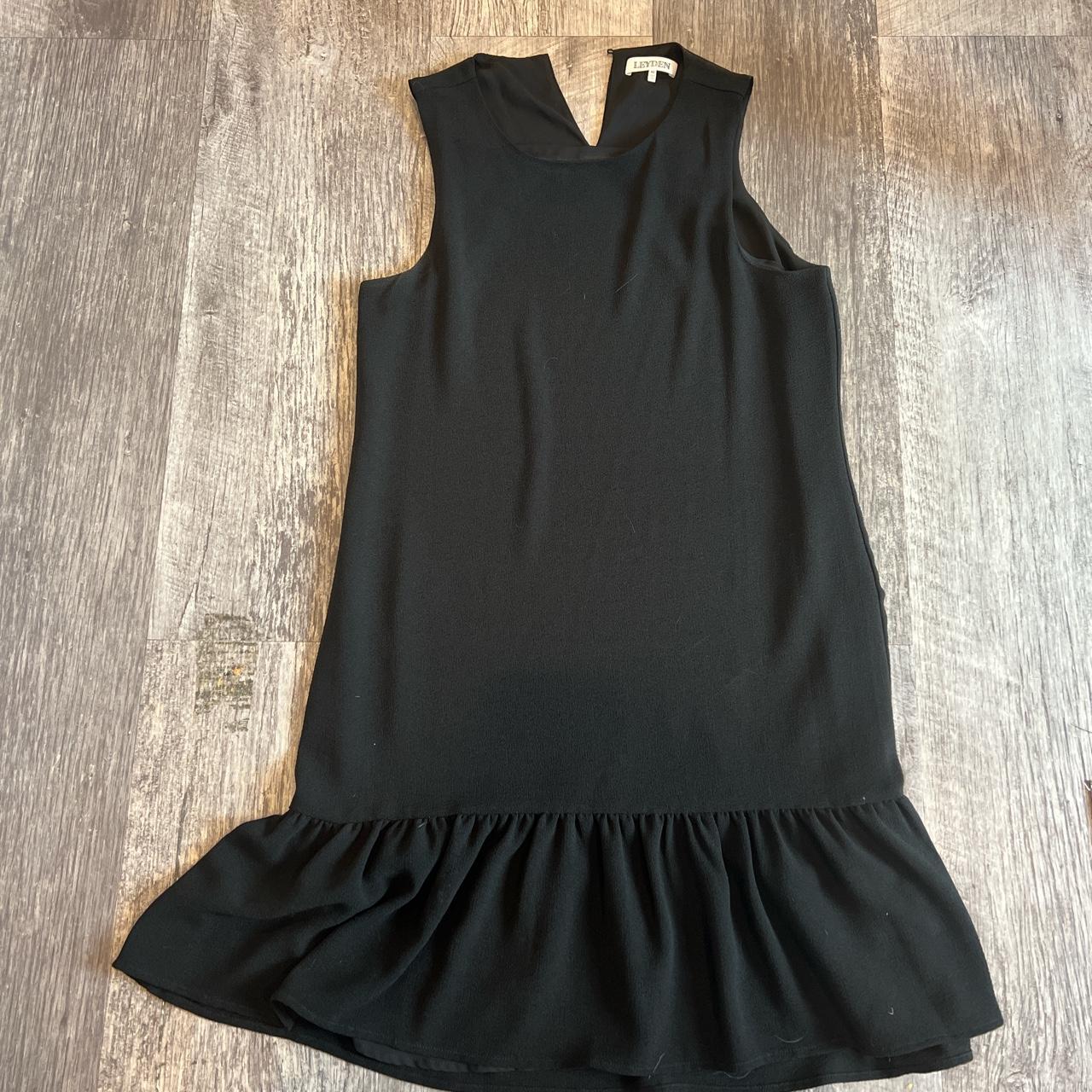 Black crepe fabric dress. A-line with ruffle at hem.... - Depop