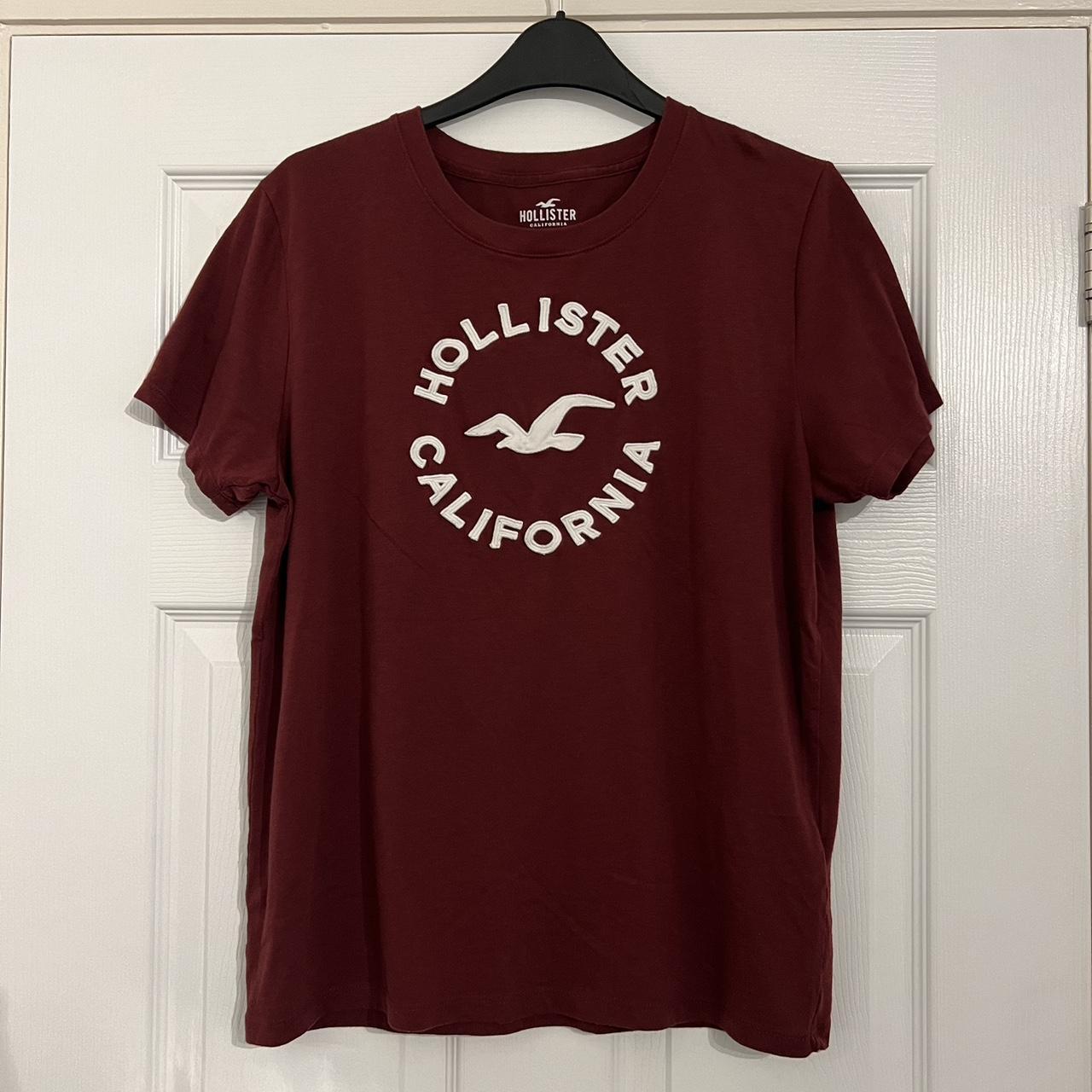 Hollister burgundy tshirt with logo Size L 14 . Depop