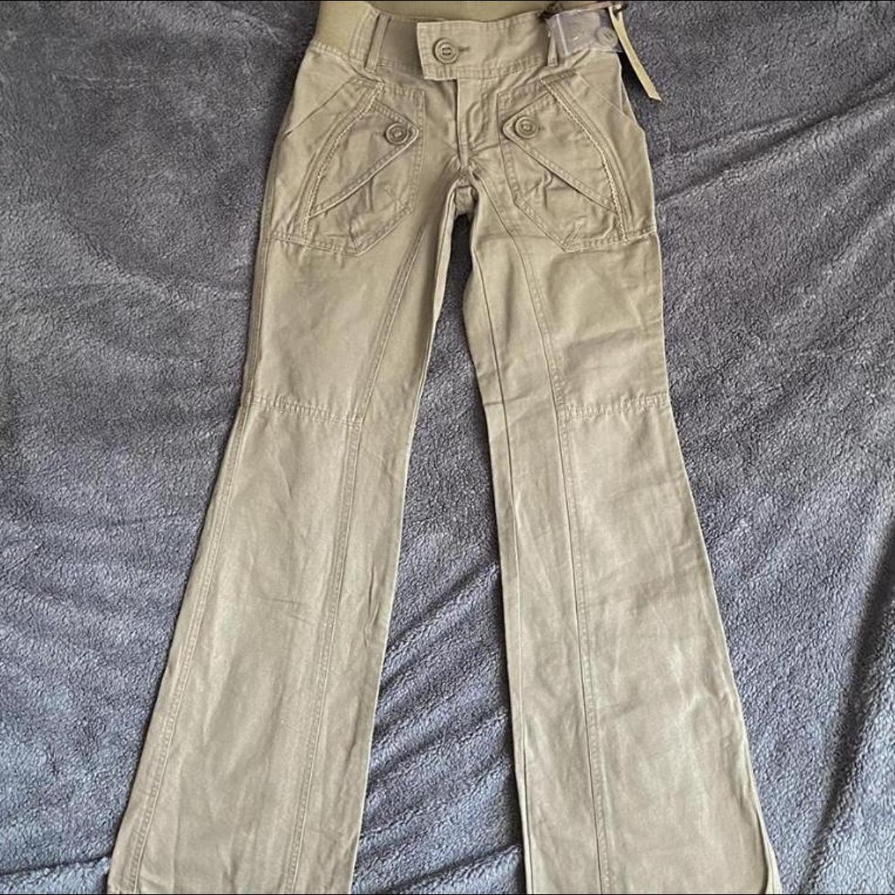 Japanese brand cargo pants! They’re a repop as they... - Depop