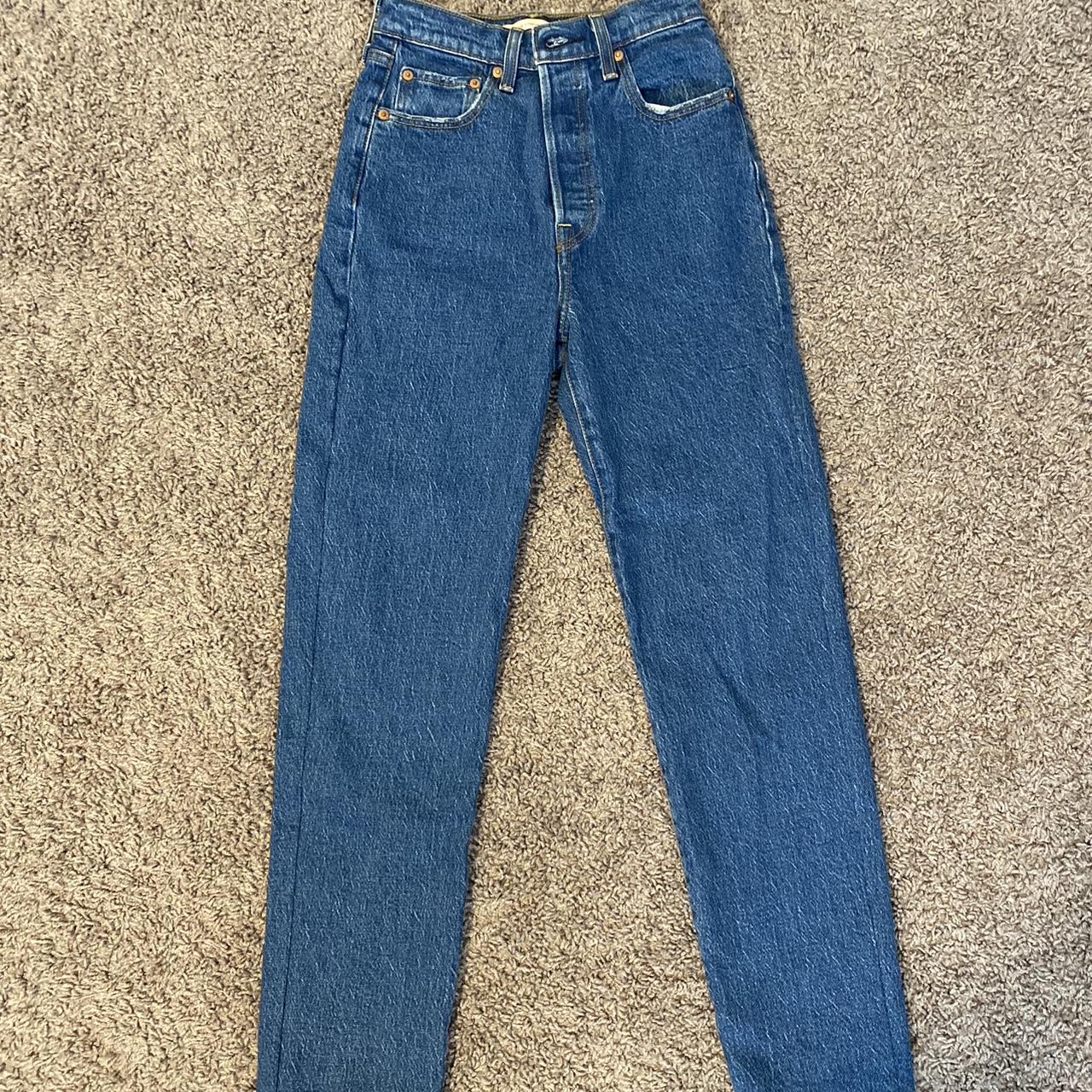 levi rib cage jeans size 25 medium- darker wash... - Depop