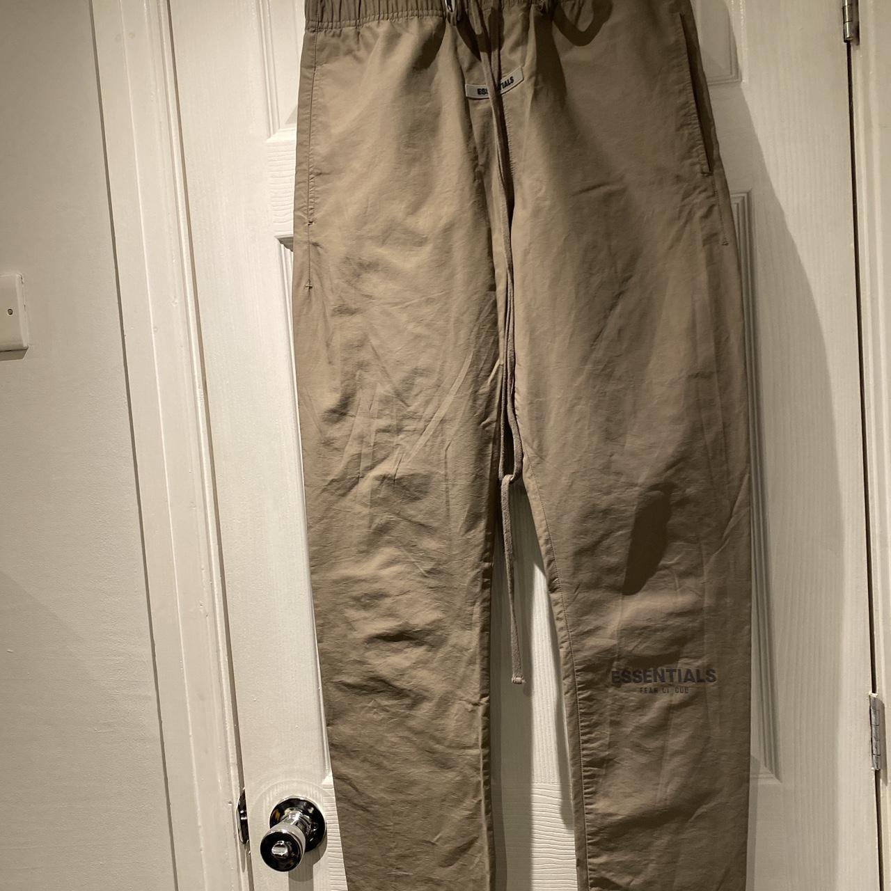 Fear of God Essentials Taupe Track pants Used in... Depop