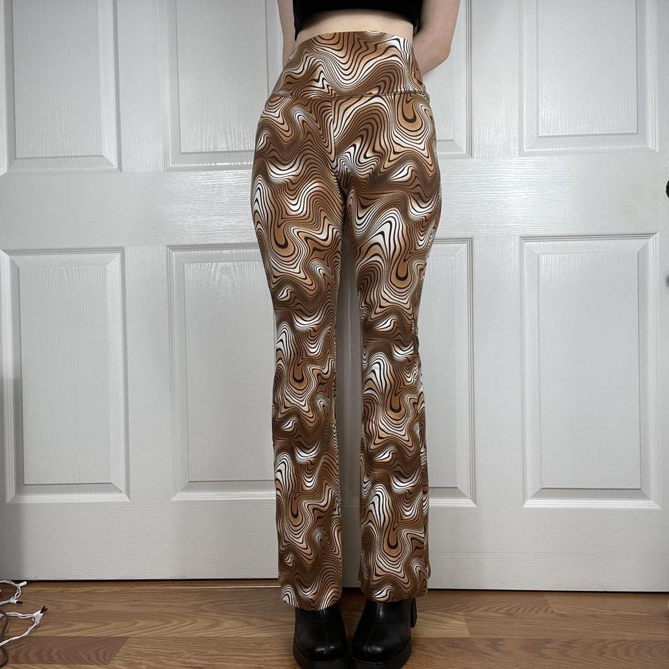 the siccckest brown and white swirly pattern flared... - Depop