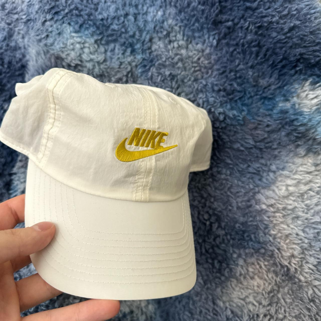 white and gold nike hat