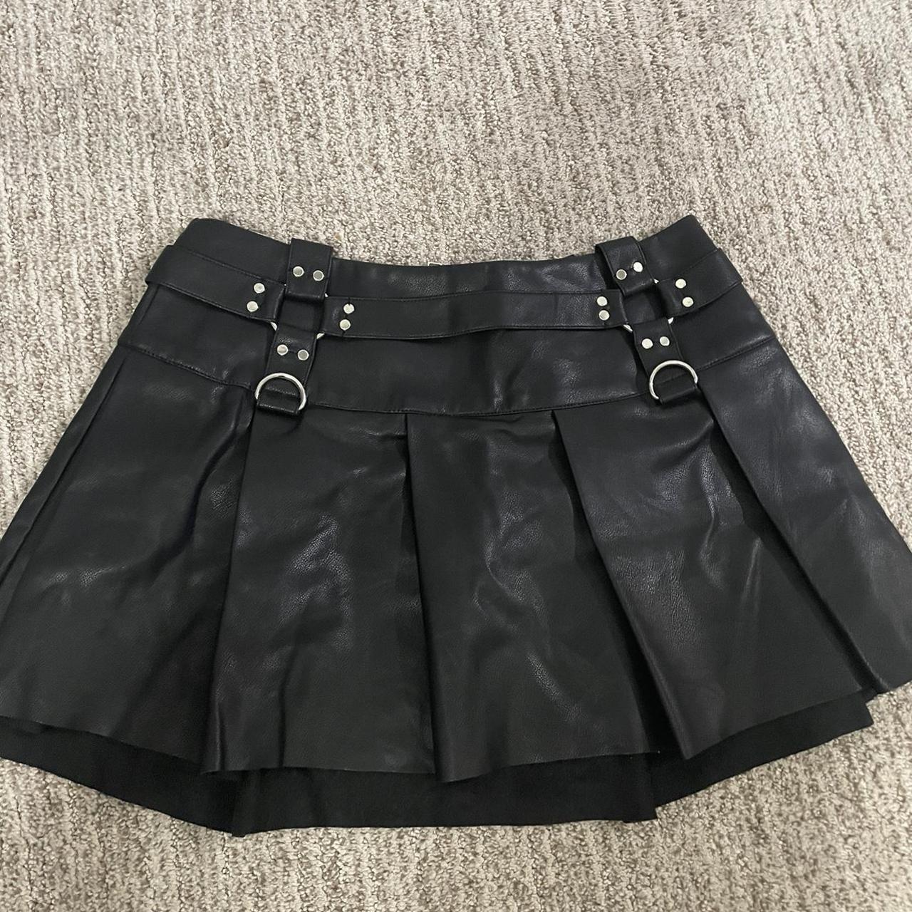 Doll’s Kill short black pleather skirt with metal... - Depop